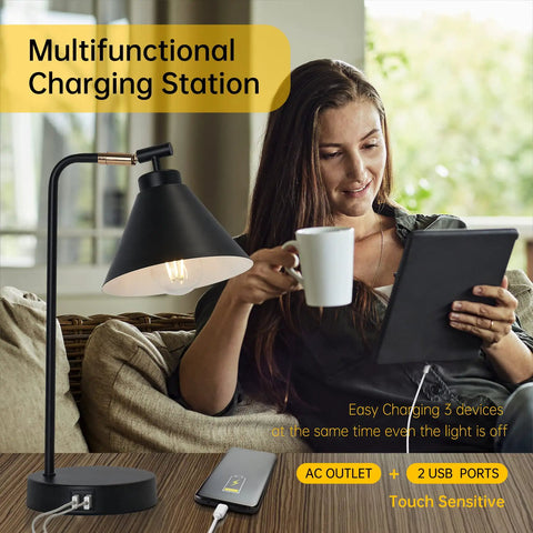 Woman using tablet next to sleek black dimmable nightstand lamp with USB ports and AC outlet, industrial metal bedside light.