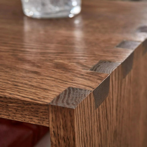 Close-up of wood finish on a corner joint, showcasing Fast Drying Oil Based Polyurethane Wood Finish In Warm Satin Tone.