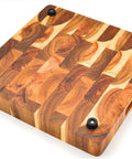 Wooden cutting board with non slip rubber feet for cutting boards with stainless screws 12 pack, installed on surface.