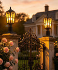 Two Pack 17 Inch Outdoor Post Light Fixtures With Motion Sensor And Dusk To Dawn, Black Pillar Lanterns illuminating a garden gate