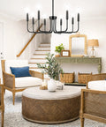 Killer 8 Light Black Chandelier With Dang Sharp Matte Finish For Farmhouse Dining Room And Kitchen Island hanging above a cozy seating area.