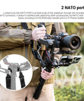 Person holding gimbal with Dual NATO Gimbal Strap for DJI RS 3 Pro RS 3 RS 2 and RSC 2, supporting camera setup.