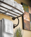 Eva Collection Brushed Nickel 26 Inch Wide Hotel Style Towel Shelf Wall Mounted Towel Rack in bathroom setting with towels.