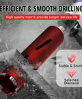 Diamond core drill bit, 2.5 in diameter, red with two adapters for concrete and masonry drilling.