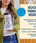 Aunt Fannie's Glass & Window Cleaning Wipes bottle with blue label (35 wipes) held by a person