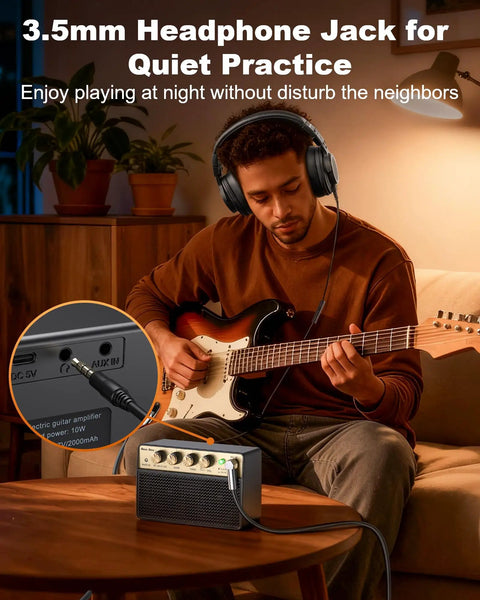 Man playing electric guitar with Portable 10W Electric Guitar Amplifier With Clean Drive Channel Pure Analog Tone USB C Rechargeable Bluetooth and 3.5mm Headphone AUX Jack Ultra Portable Practice Amp For Home Dorms And On The Go on table.