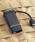 Clip On Hands Free Light With Rechargeable Power, 70 Lumen Output And 500 Candela, attached to tan tactical gear