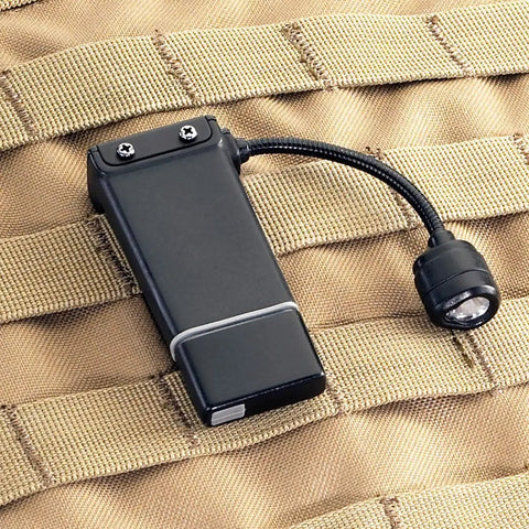 Clip On Hands Free Light With Rechargeable Power, 70 Lumen Output And 500 Candela, attached to tan tactical gear