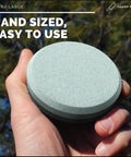 Person holding Dual Grit Axe Sharpener Stone For Axe And Hatchet Large Whetstone Waterstone With Bamboo Box