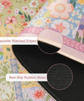 Close-up of Pink Floral XXL Desk Pad For Keyboard And Mouse Extended 35.4 By 15.7 Inches Anti Slip Big Mouse Pad With Stitched Edges.