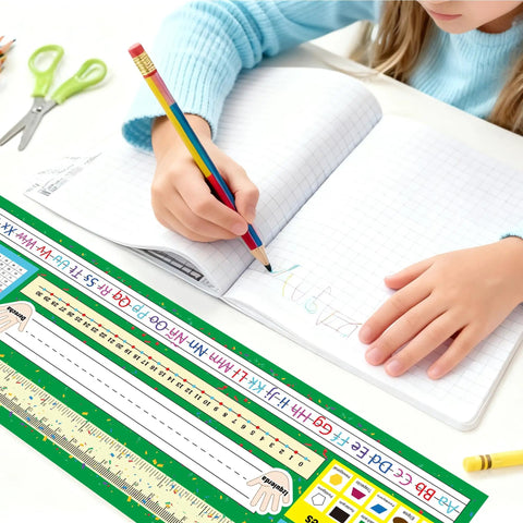 Student writing in notebook with Durable 30 Pack Spanish Desk Nameplates Waterproof 4X14 Inch Name Tags For Classroom Use visible on desk