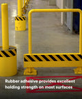 Yellow barrier and pole marked with High Visibility Striped Vinyl Safety Tape for Lane and Floor Marking, Rubber Adhesive, 2 Inch By 36 Yard, 5.4 Mil, Easy Clean Removal, Durable Workhorse Caution Tape, Abrasion-Resistant Black Yellow in an industrial setting.