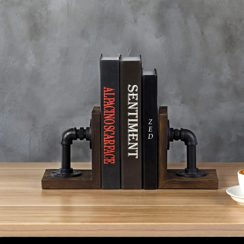Legit Industrial Bookends Featuring Charred Pine And Genuine Metal Pipe Fittings And Badass 2 Piece Set For Modern Farmhouse Desks and Rustic Steampunk Home Decor, holding three books on a wooden table.