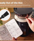 Legit Precision Coffee Grinder with Built in Dosing Scale and Conical Burr System Delivers Straight Up Accurate Results across Eight Grind Steps Perfect for Espresso Pour Over French Press Cold Brew, Matte Black showing scale, brush, and user guide.