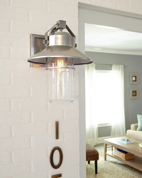 Boynton Outdoor Wall Light With Transitional Stone Finish, 10.75 Inch Tall, E26 Medium Base Socket, installed indoors on brick wall