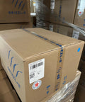 Plug And Play Smart Level 2 EV Charger 40 Amp WiFi Wall Mount cardboard box stored in warehouse, labeled with GRIZZL'E branding.