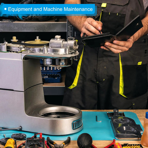 Technician maintaining machinery on workbench with tools and equipment for machine servicing