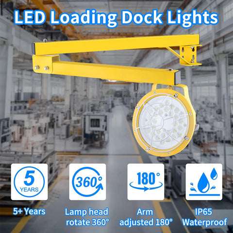 Tough As Nails 30W LED Loading Dock Light With 43 Inch Swivel Arm 3300 Lumen, yellow arm and lamp head in warehouse.