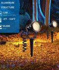 5W AC120V Landscape Up Down Spotlight With Spiked Stand And Base in a garden setting, highlighting trees with warm light