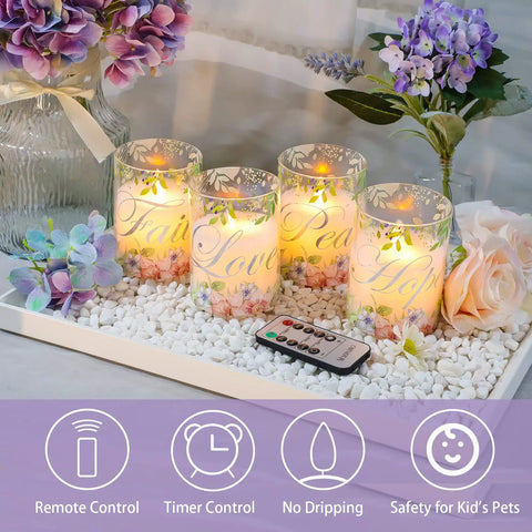Flameless Real Wax Floral LED Candles With Remote And Timer 4 Pack For Home Decor Parties And Holiday Tables Glass Covered Flickering Candles Create Cozy Ambience Without Mess placed on white stones with flowers and remote control.