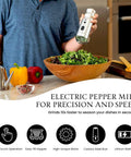 Person using an Electric Pepper Grinder with LED Light, Rechargeable and Up to 10X Faster One Touch Operation near salad bowl.
