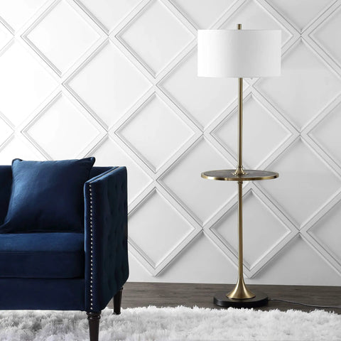 59 Inch Black And Brass Gold Floor Lamp With Integrated Wood Side Table next to blue sofa and textured white wall