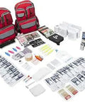 Two red backpacks with contents of All In One Family Emergency Kit Backpack For Earthquakes Floods Disasters Civil Unrest And Outdoor Adventures