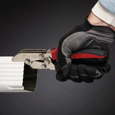 Five Blade Downspout Crimper Tool For Aluminum And Steel Delivers A One And A Quarter Inch Double Crimp, shown in use on a downspout.