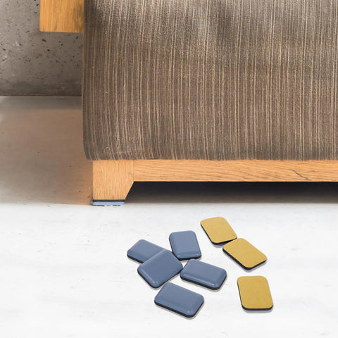Heavy Duty Self Adhesive Furniture Sliders For Carpets 16 Pack 1.4 By 1 Inch Rectangle Glide Pads next to sofa leg on carpet