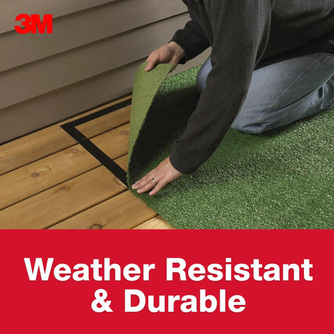 Person applying Heavy Duty Double Sided Rug Tape That Grips And Keeps Rugs From Sliding In High Traffic Areas Indoors Or Outdoors