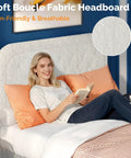 White Queen Boucle Upholstered Platform Bed With Rounded Headboard Sturdy Wood Slats Plush Cloud Back Cushioning in cozy bedroom setting.