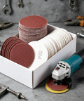 100 Pack 3 Inch 80 Grit Sanding Discs With Hook Loop Backing For Drills And Grinders arranged in a white box with a tool.