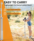 Beefy 9.2 Ft Heavy-Duty Light Stand Kit Two Pack with Dual Springs in outdoor setup with photographer and camera support.