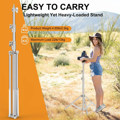 Beefy 9.2 Ft Heavy-Duty Light Stand Kit Two Pack with Dual Springs in outdoor setup with photographer and camera support.
