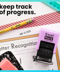 No Sweat Self Inking Date Stamp For Fast Shipping Receiving And Inventory Tracking Clean Black Ink With Easy Twist Dials For Expiration Checks And Reliable Violet Mount on paper and pencil.