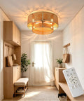 FUMLTP Boho Caged Ceiling Fans with Lights, Remote Control, Flush Mount in a stylish foyer setting with wooden furniture.