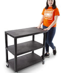 Three Shelf Flat Top Utility Cart That Handles Up To 300 Lbs Heavy Duty HDPE Shelves With Durable PVC Legs Smooth Rolling Wheels With Locking Feature A Workhorse For Office Warehouse Or Garage Storage And Easy Transport. Black 3-shelf cart with locking wheels