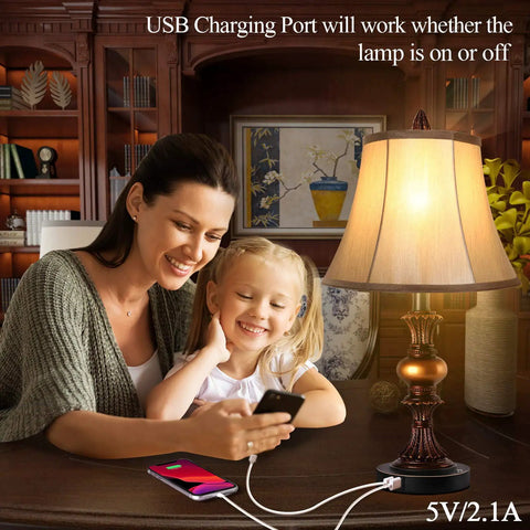 Two Pack Touch Control Traditional Table Lamps With Dual USB Ports, 3 Way Dimmable Bronze Finish Bell Shade in living room setting.