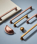 Set of cabinet hardware including 10 Pack 3 Inch Vintage Cup Pulls Antique Copper Cabinet Hardware for Kitchen and Furniture