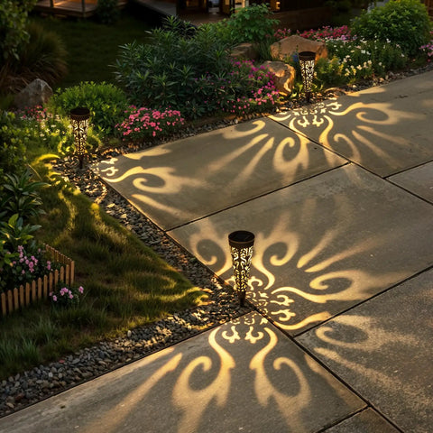 Solar Powered Fire Totem Style Outdoor Garden Lights Six Pack Waterproof Conical Stakes illuminating pathway at night