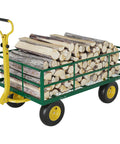 22 Cu Ft Steel Tow Behind Dump Cart for ATVs and UTVs loaded with firewood, featuring yellow handle and wheels, durable frame