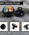 Four Pack Colorful Tree of Life Cabinet Knob Set for Kitchen and Bathroom on textured fabric, multicolor stained glass design visible.
