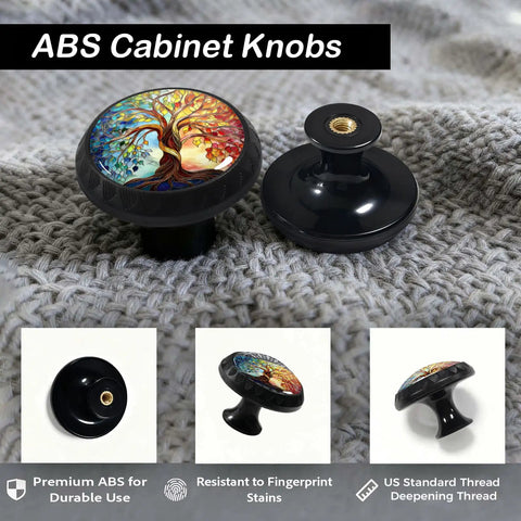 Four Pack Colorful Tree of Life Cabinet Knob Set for Kitchen and Bathroom on textured fabric, multicolor stained glass design visible.
