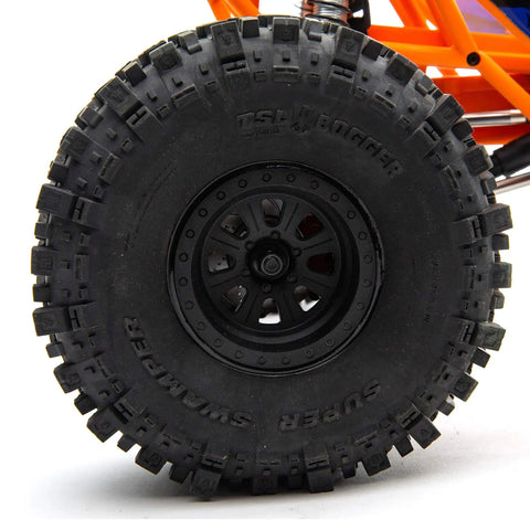 Close-up of RBX10 Ryft 4WD Brushless RC Rock Bouncer Ready To Run Beast On The Trail With Solid Front And Rear Axles wheel
