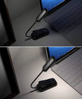 Grab And Go Clip On Book Light With 12 LED USB Rechargeable Battery illuminating a laptop keyboard in a dim room
