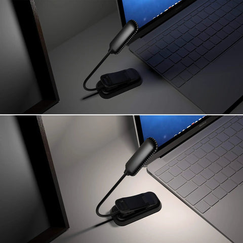 Grab And Go Clip On Book Light With 12 LED USB Rechargeable Battery illuminating a laptop keyboard in a dim room