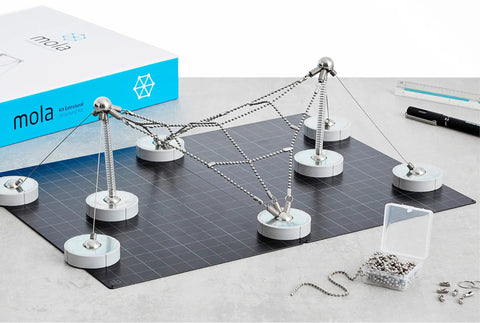 Magnetic Modular Kit For Engineering And Architecture Education with 205 pieces displayed on a grid with box and components.