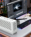 External GPU Dock For Laptops Featuring Heavy Duty Metal Frame And Real PCIe 4.0 Support on modern desk setup with computer monitor.