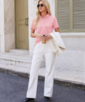 Woman wearing Light Pink Women Polo Shirt with Short Sleeve 3 Button Collared Golf Style Cotton Blend Lightweight Breathable Top Size M