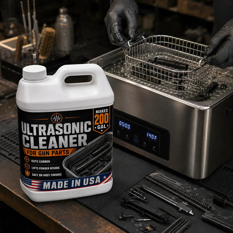 Pro Grade Ultrasonic Gun Cleaner Solution That Hits Different On Stubborn Carbon And Gun Oil With Zero Hard Scrubbing One Concentrated Gallon Mixes Straight Into Two Hundred Ready To Shoot Parts USA Made in use with metal basket in ultrasonic cleaner.